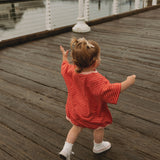 Cory Pocket Romper in Thin Aurora Red Stripe