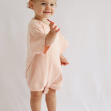 Cory Pocket Romper in Peach Powder