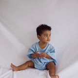 Cory Pocket Romper in Dream Blue